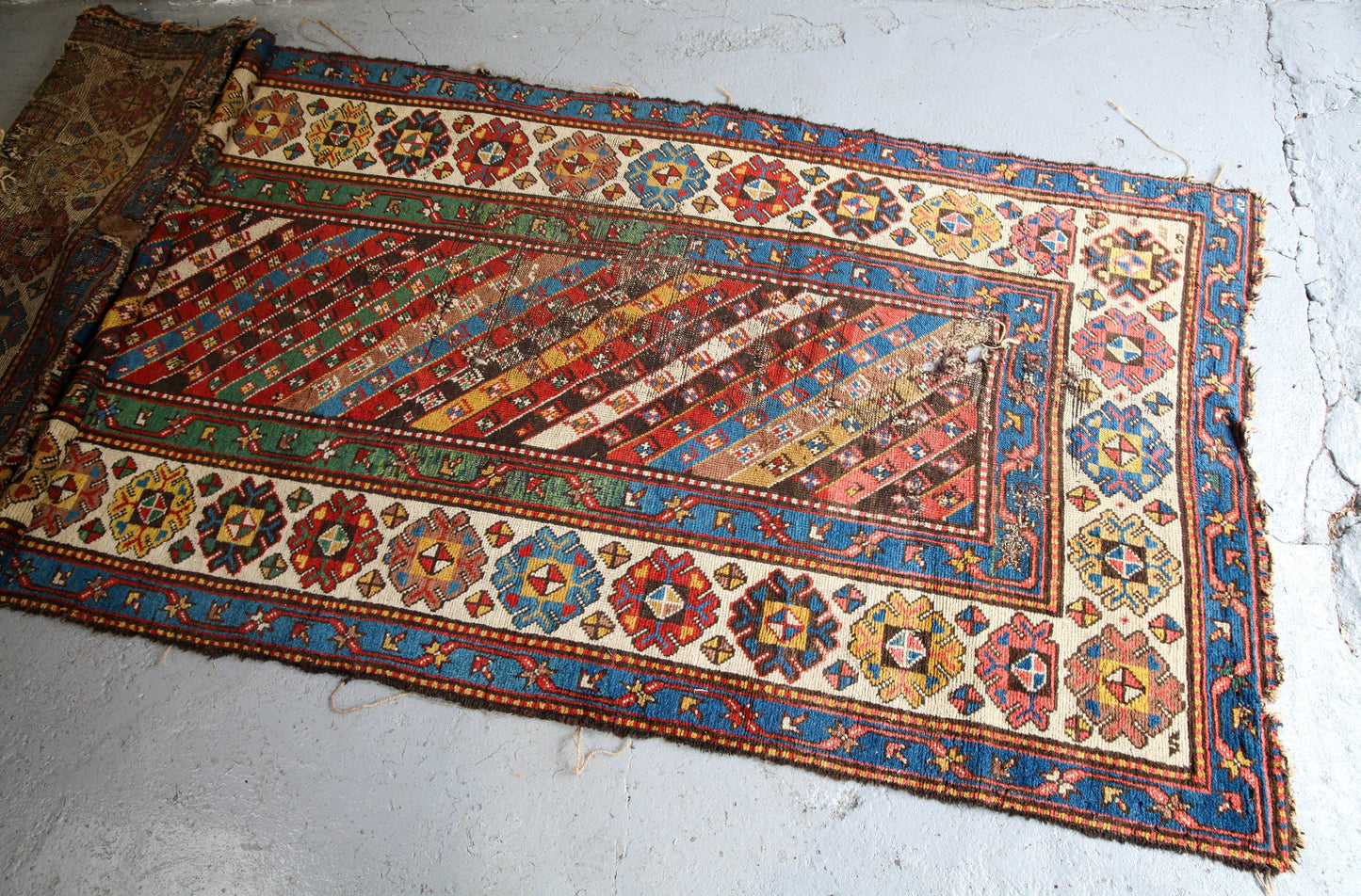 Antique, evocative late 19th century Genje Caucasian carpet / hallway runner in blue, red, green and yellow