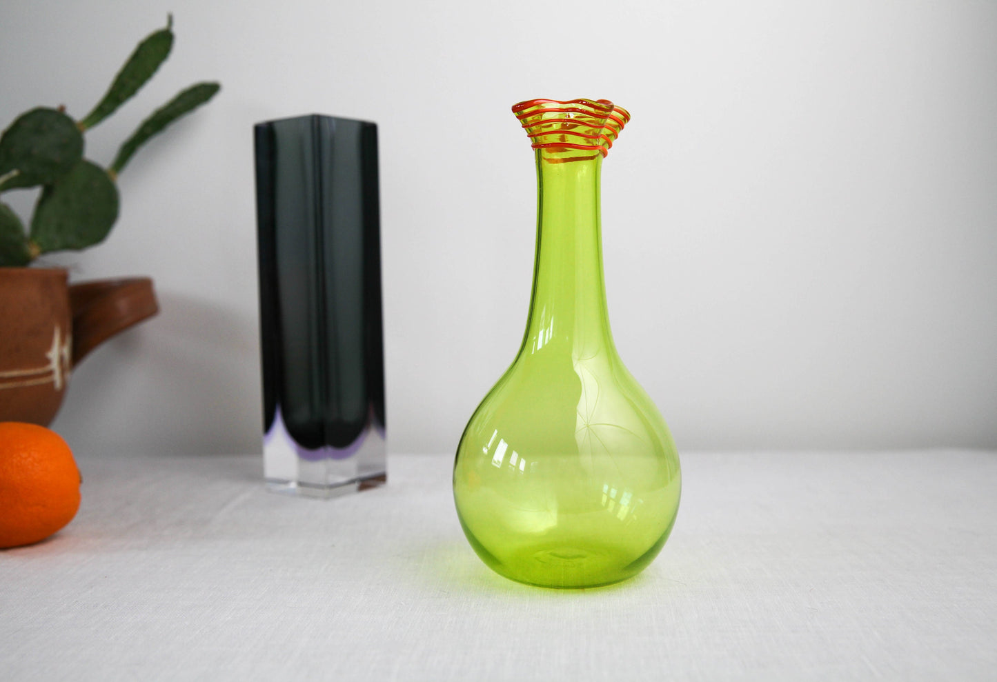 Delightful vintage citron green and red glass vase